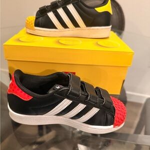 Adidas LEGO Black, Red, and Yellow Sneakers